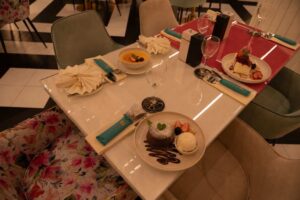 Elegant dessert table in a cozy restaurant